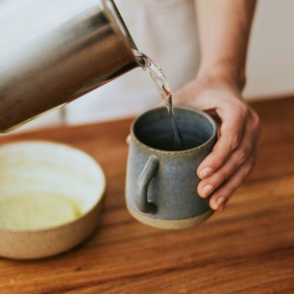 Adding-hot-boiling-water-to-premix